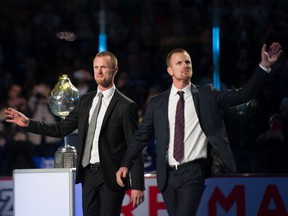 Henrik (left) and Daniel Sedin are moving into more on-ice teaching and counseling of young players and prospects in the Canucks organization, both in Vancouver and at AHL Abbotsford.