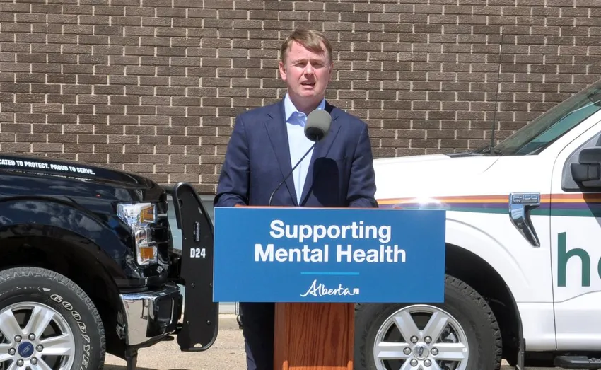 Alberta Justice Minister Tyler Shandro takes questions from reporters after meeting with Edmonton Mayor Amarjeet Sohi on May 22, 2022.