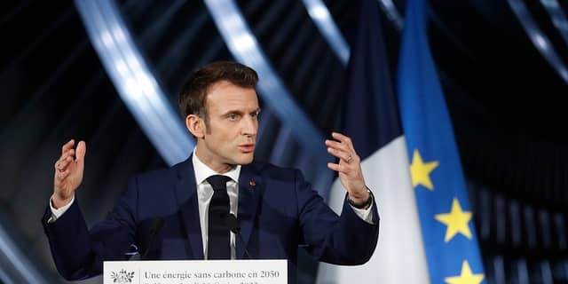 French President Emmanuel Macron delivers a speech at GE Steam Power System's main production site for its nuclear turbine systems in Belfort, eastern France, on February 10, 2022. 