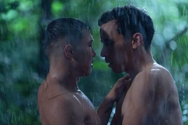 Noah (Joel Kim Booster, left) and Will (Conrad Ricamora) almost kiss after a heated confrontation on "Fire Island."