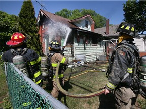 Windsor firefighters are shown at a house fire on Janette Avenue in Windsor on Friday, June 24, 2022.