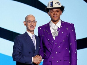 Paolo Banchero shakes hands with NBA commissioner Adam Silver after being selected as the first overall pick by the Orlando Magic in the 2022 NBA Draft at Barclays Center in Brooklyn, NY, Thursday, June 23, 2022.