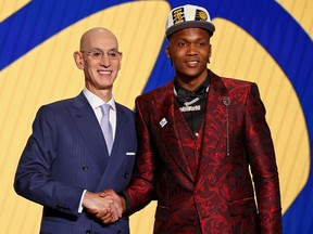 Bennedict Mathurin (Arizona) shakes hands with NBA commissioner Adam Silver after being selected as the No. 6 overall pick by the Indiana Pacers in the first round of the 2022 NBA Draft at Barclays Center in Brooklyn, NY, on Thursday, June 23, 2022 .