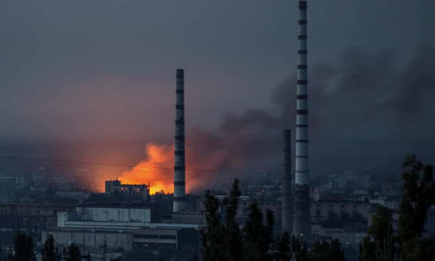 Smoke and flame rise after a military strike on a compound of Sievierodonetsk’s Azot chemical plant in the Luhansk region on Saturday