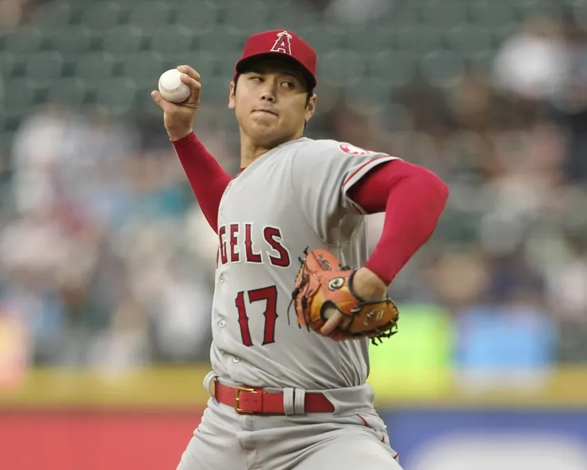 Shohei Ohtani of the Los Angeles Angels throws against the Seattle Mariners during the fourth inning of a baseball game Thursday, June 16, 2022, in Seattle.