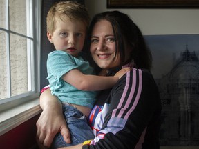 Carolyn Hofbauer with her two-and-a-half-year-old son Blake at their home in Surrey, BC., June 21, 2022. When a child care center gets picked by to be a -a-day site, parents say it's like winning the lottery.  By the end of the year, the BC government will double the number of subsidized -a-day spots from 6,500 to 12,500.
