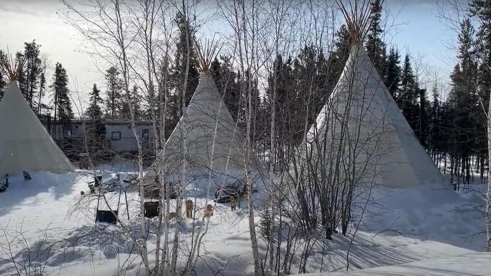 Teepees in the snow.