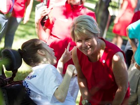 Jennifer Jones, Rotary International president-elect, speaks with Ashley Gialelem at Jackson Park in Windsor on June 27, 2022, following a ceremony honoring the Windsor woman's new position.